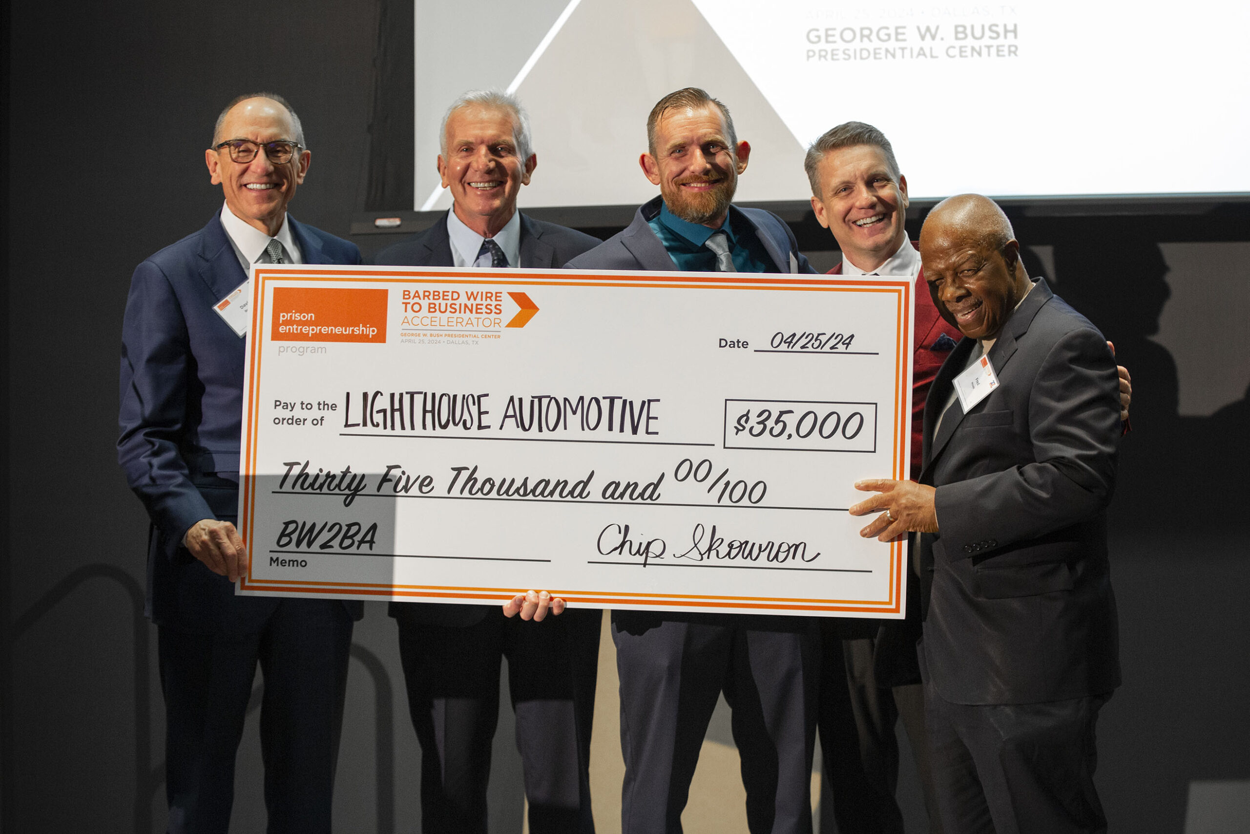 Lighthouse Automotive team awarded $35,000 prize check at PEP Barbed Wire to Business Accelerator event