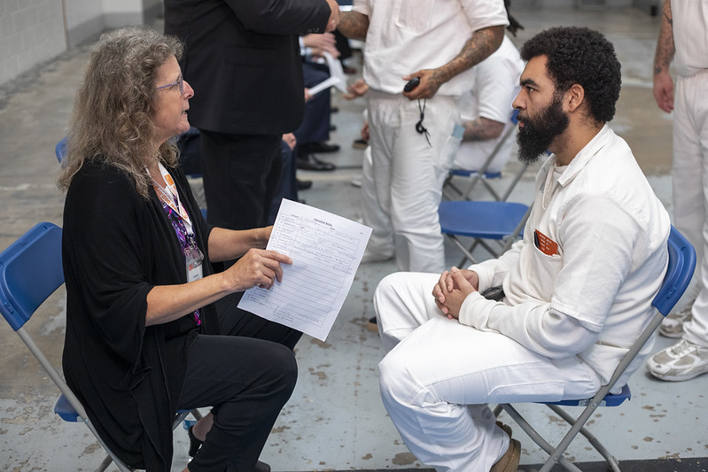 PEP volunteer conducting one-on-one mentoring session with program participant